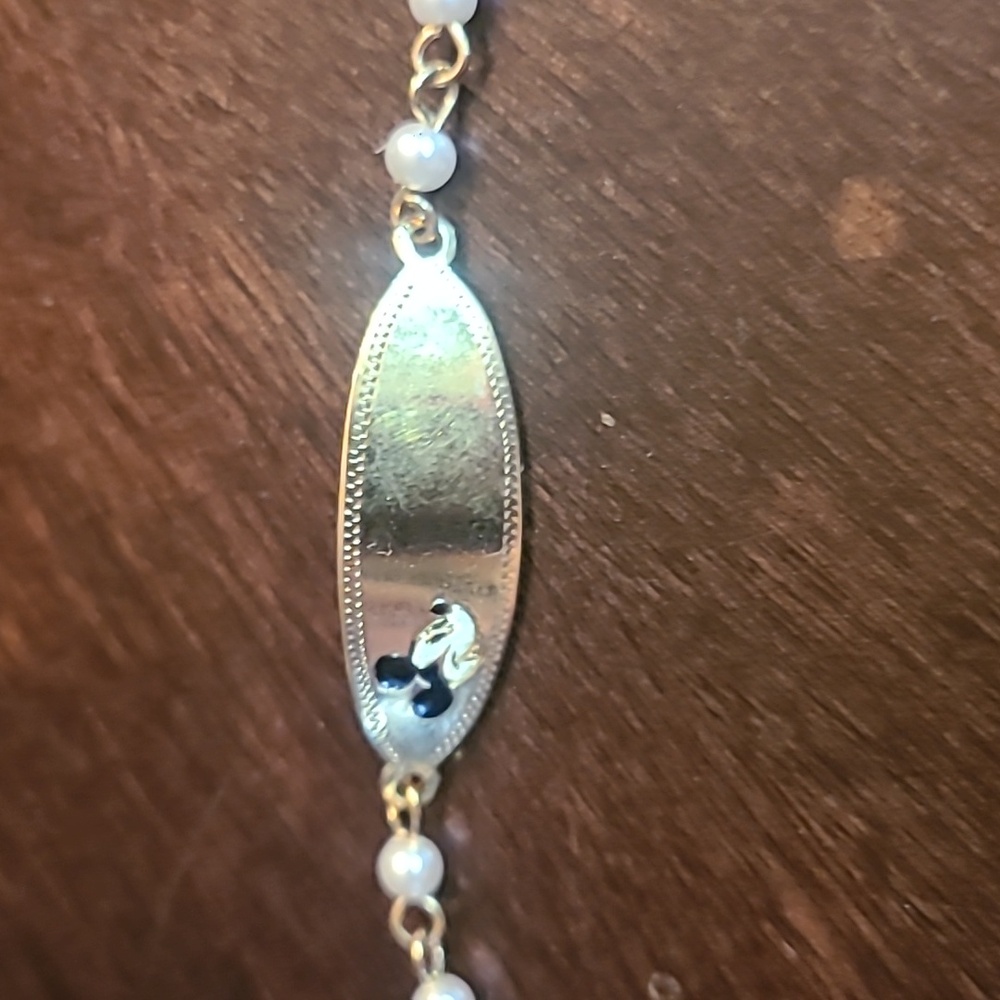 Disney Child's Gold Tone bracelet